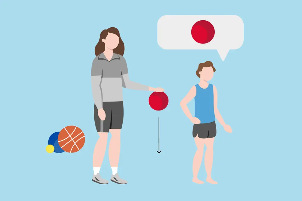 Trainer und Schüler beim Ballsport